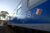 Grau-blau lackierter Eisenbahnwaggon mit der französischen Fahne und dem Schriftzug TMFB für Train militaire français de Berlin